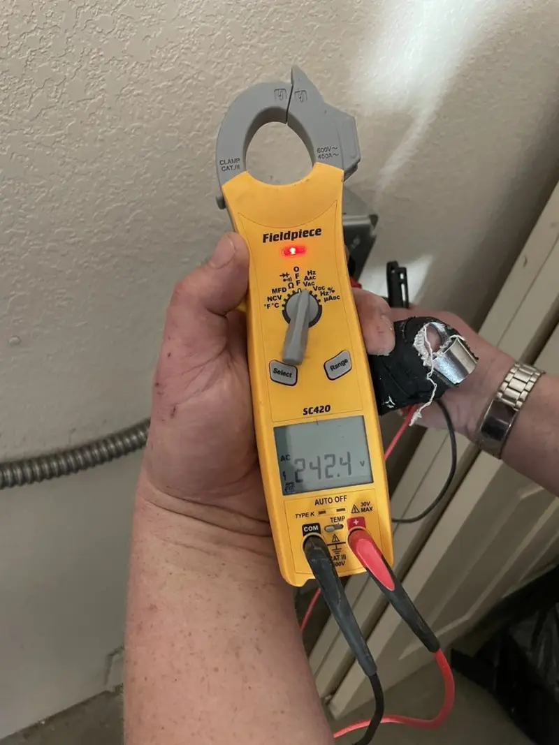 Voltage testing with clamp meter during Generator Installation in Springfield